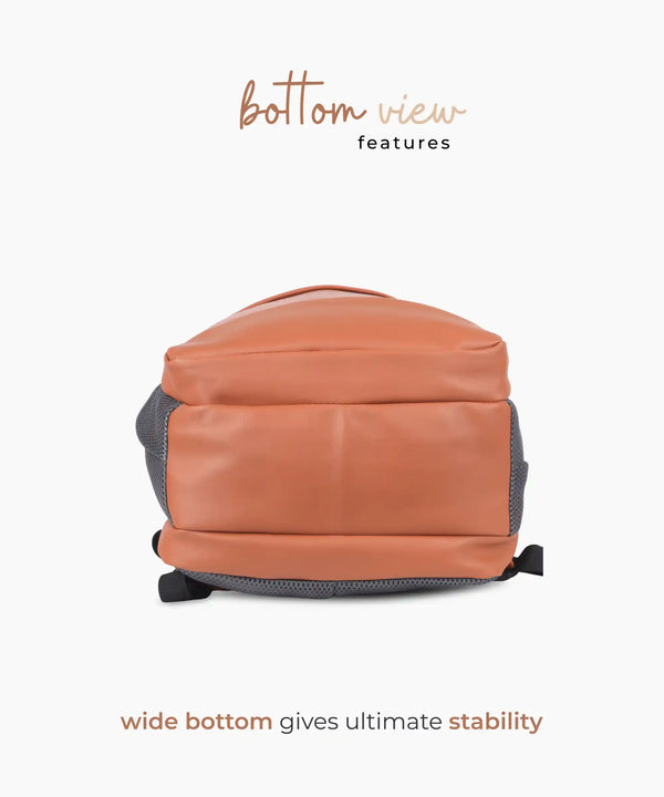 PU leather unisex backpack in tan with padded laptop compartment